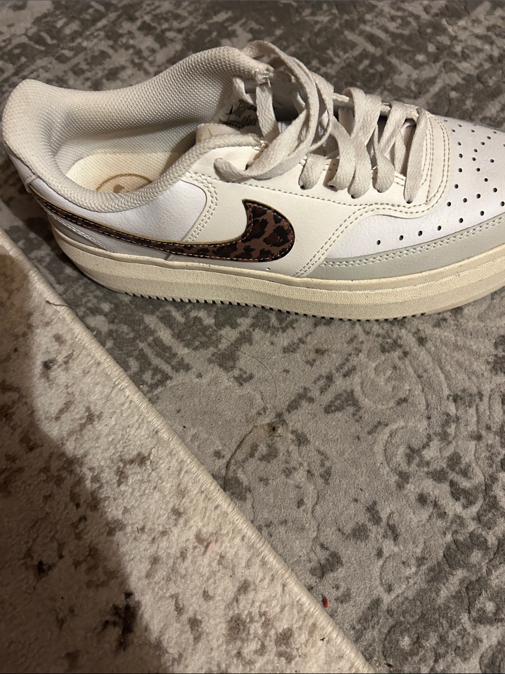 Nike White Low-Top Sneaker with Brown Leopard Swoosh